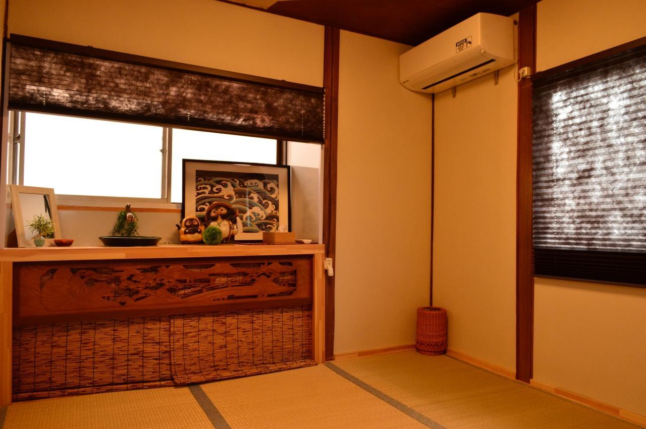 Guesthouse Oasis Ōsaka Extérieur photo